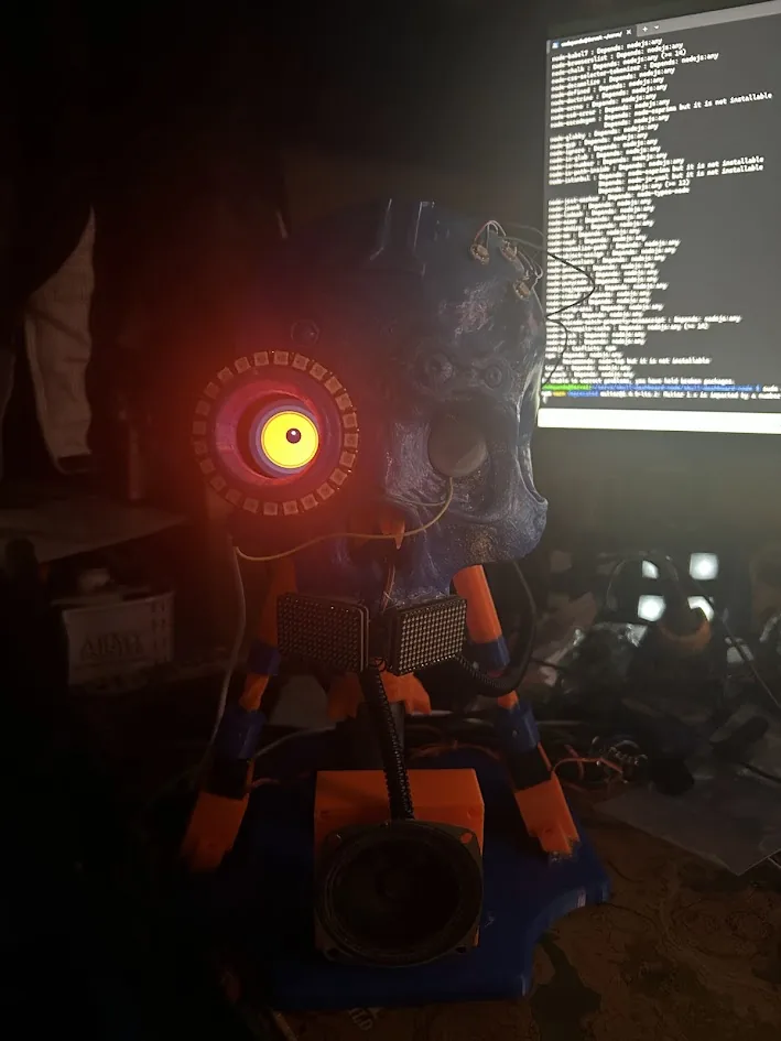 Servo skull prototype with red illuminated eye and live code
